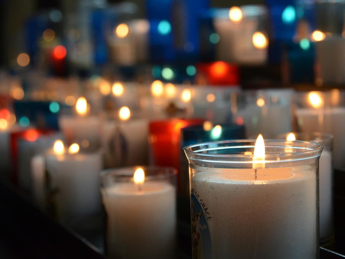 Candles are lit on All Saints Day in Hungary's cemeteries